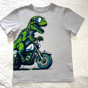 Place Gray T-Shirt with Green Dinosaur on Motorcycle